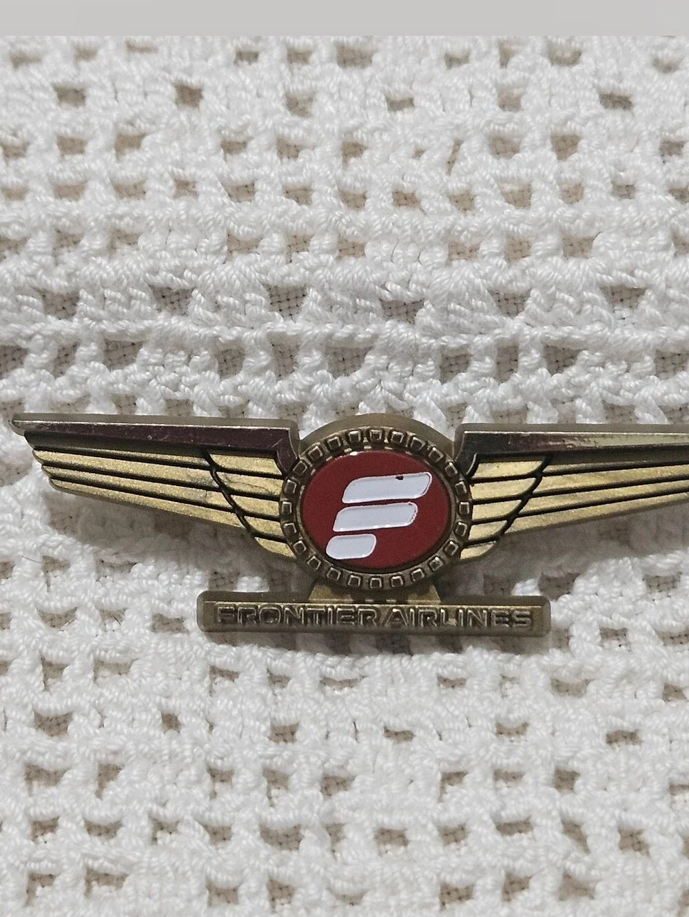 vintage 1970s Frontier Airlines Junior Pilot lapel pin.